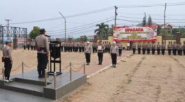 Kapolres Kotamobagu AKBP Abdul Kholik memimpin upacara PTDH Aiptu Fahri Rimporok sebagai penegakan disiplin Polri.