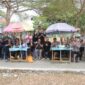 Kapolres Kotamobagu Abdul Kholik ngopi bersama warga untuk menyerap aspirasi dan memperkuat komunikasi terkait kamtibmas.
